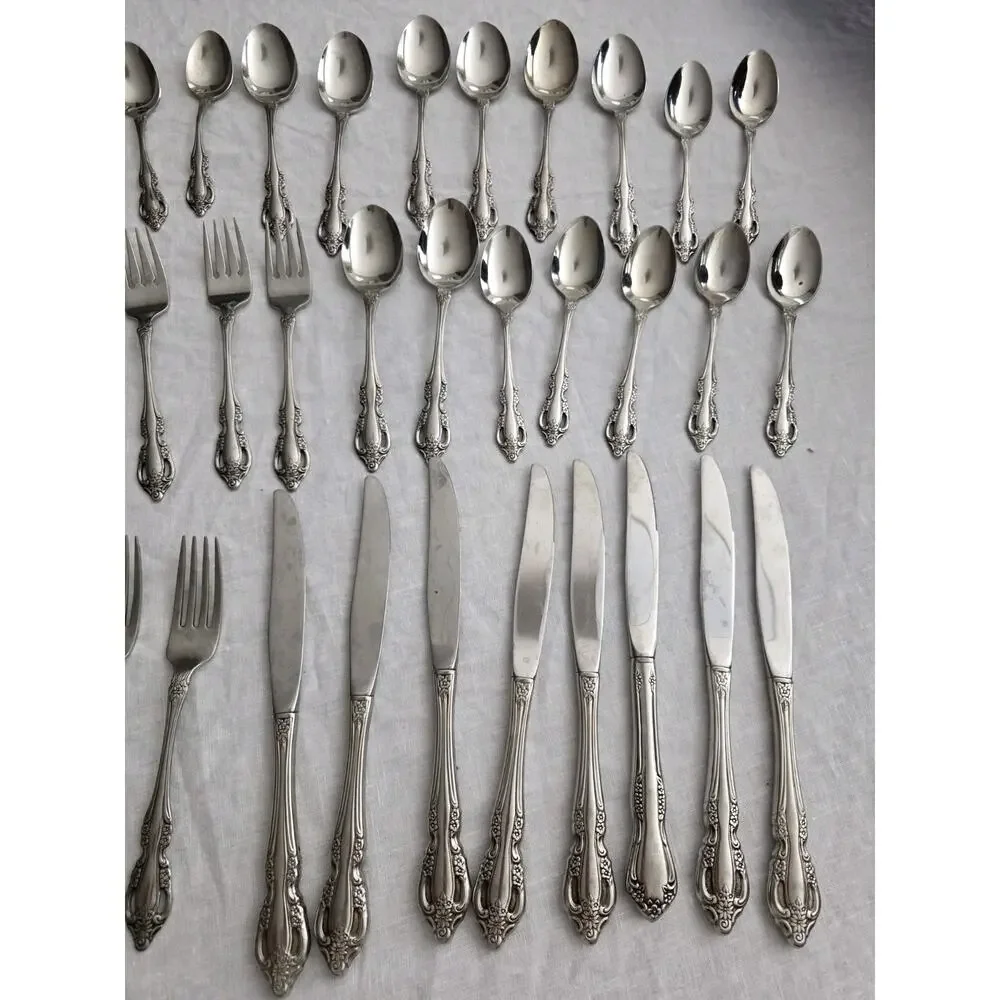 Oneida Samantha Pierced 40 Pc Set USA Stainless Flatware Cutlery